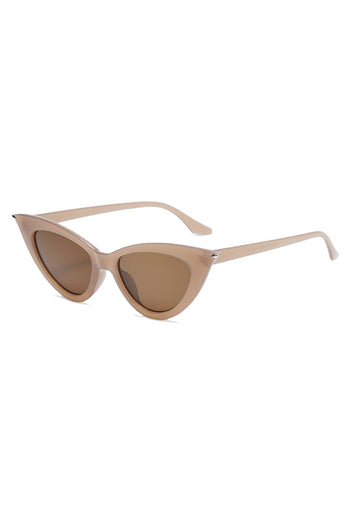 Stay shady with our Atomic Brown Pointed Cat Eye Sunglasses. This pair of sunglasses features a pointed cat eye frame, gradient lens, and it's light on the nose.