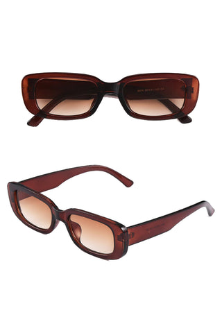 Wear the Atomic Brown Vintage Retro Rectangle Small Sunglasses for a spectacular look. This pair of sunglasses features a small rectangle frame design, gradient lens, and it's light on the nose.