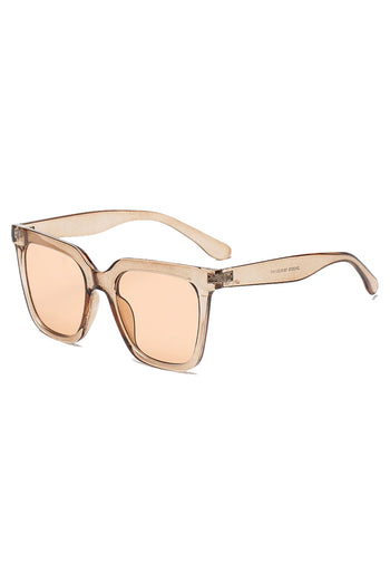 Looking glamorous is easy with Atomic Clear Brown Vintage Square Sunglasses. This pair of sunglasses features retro-inspired big square frames, gradient lens, and it's light on the nose.