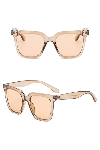 Looking glamorous is easy with Atomic Clear Brown Vintage Square Sunglasses. This pair of sunglasses features retro-inspired big square frames, gradient lens, and it's light on the nose.