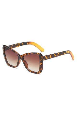 All eyes on you with this beautiful Atomic Leopard Butterfly Retro Sunglasses. This pair of sunglasses features retro-inspired big square frames, gradient lens, and it's light on the nose.
