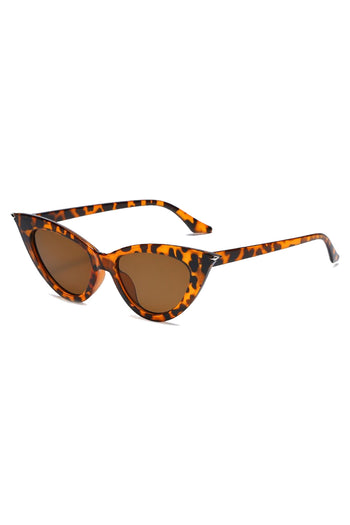 Stay shady with our Atomic Leopard Pointed Cat Eye Sunglasses. This pair of sunglasses features a pointed cat eye frame, gradient lens, and it's light on the nose.